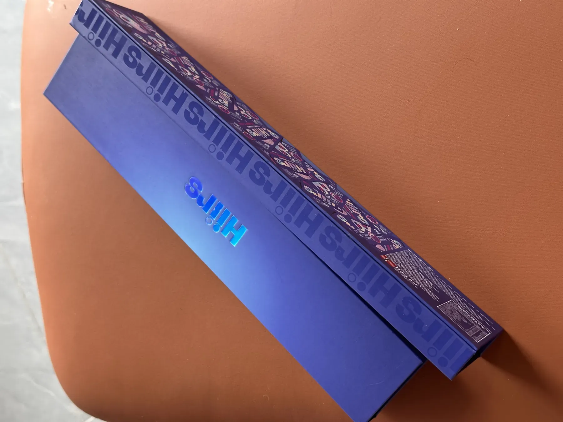 HIIRS display box lid with holographic wordmark