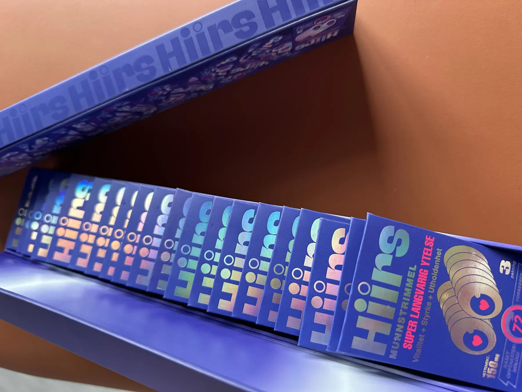 Open HIIRS display box with holographic sachets fanned out